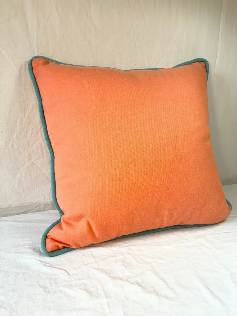 Coral Orange Throw Pillow with Teal Piping